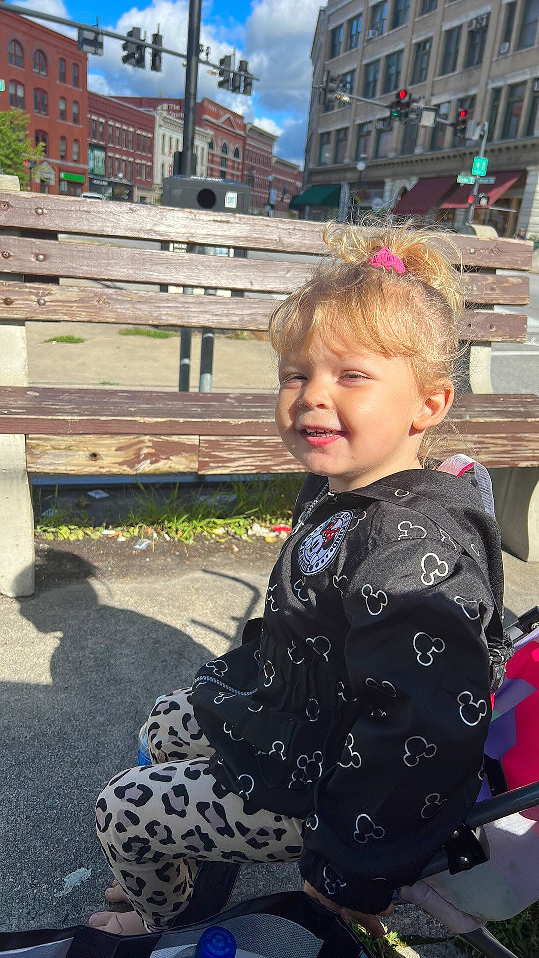 Brynn joined the competition — help win amazing prizes! baby_toddler_clothing, blue, child, city, fun, grass, hairstyle, happy, leisure, pattern, person, sitting, sky, sleeve, smile, toddler, tourism, travel, tree, vacation