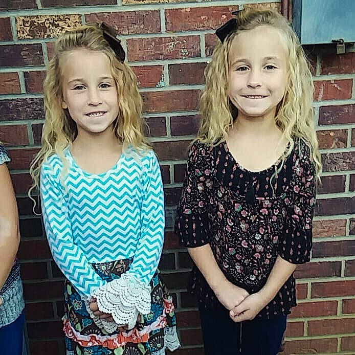 Alli joined the competition — help win amazing prizes! child, clothing, day, design, fun, girl, hair, human_hair_color, joy, outerwear, pattern, person, photography, plaid, portrait_photography, shoulder, sibling, sleeve, smile, t_shirt