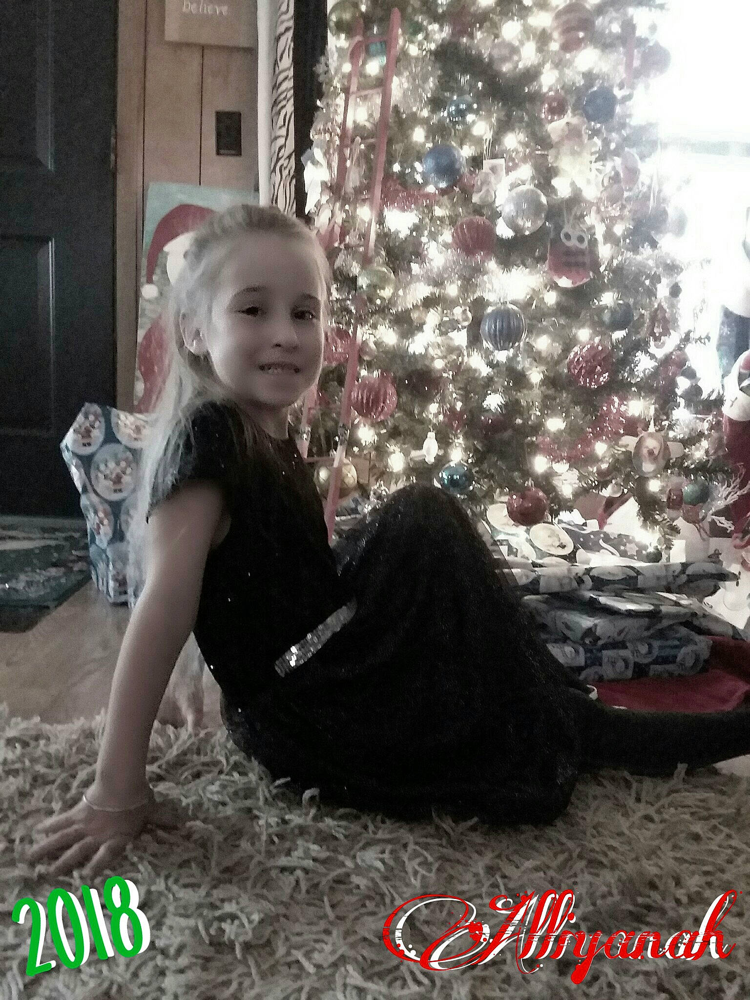 Alli is registered to the contest to win money with this photo: christmas, girl, mammal, person, product, toddler, tree, vertebrate