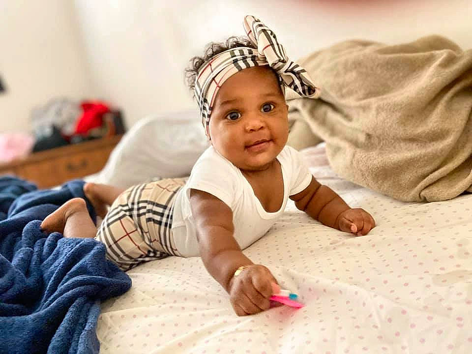 Samaya joined the competition — help win amazing prizes! arm, baby, beauty, child, cool, ear, footwear, hair_accessory, hand, head, headband, headgear, headpiece, headwear, human, leg, person, product, shoe, sitting