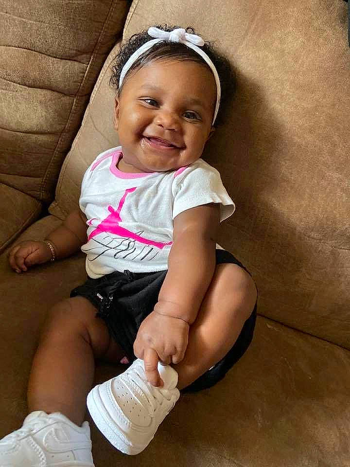 Samaya joined the competition — help win amazing prizes! baby, baby_products, baby_toddler_clothing, cheek, child, fun, hair_accessory, headband, headgear, joy, leg, person, pink, product, sitting, skin, smile, toddler
