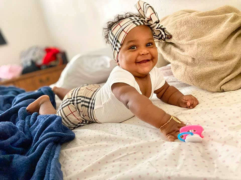 Samaya joined the competition — help win amazing prizes! arm, baby, baby_toddler_clothing, child, cool, ear, fashion_accessory, footwear, hair_accessory, happy, head, headband, headgear, headpiece, headwear, joy, leg, person, product, sitting