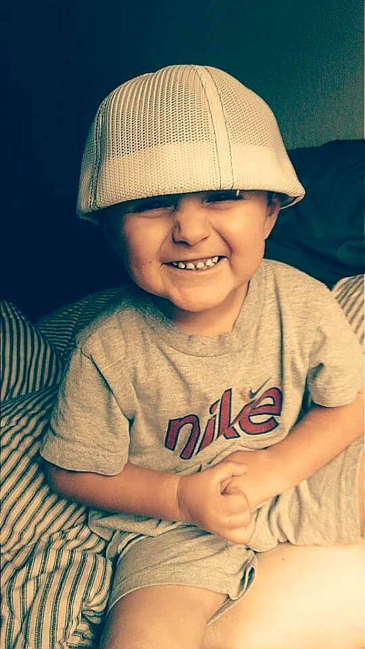 Jaxon is registered to the contest to win money with this photo: baby, baby_toddler_clothing, cap, chin, clothing, eye, face, flash_photography, hairstyle, happy, hat, head, headwear, helmet, joy, lip, organ, person, skin, sleeve