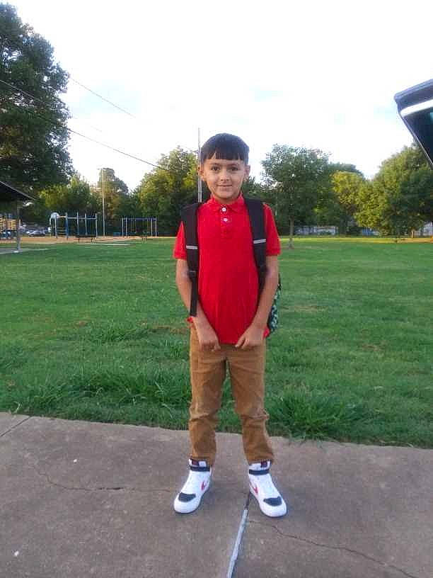 Jaxon joined the competition — help win amazing prizes! asphalt, cloud, competition_event, electric_blue, fun, grass, grassland, joy, knee, leisure, person, plant, player, recreation, running, shorts, sky, sports, t_shirt, tree