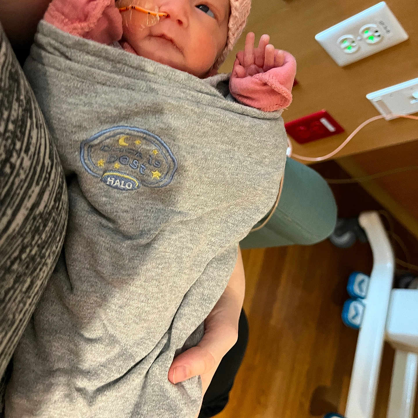 Luna joined the competition — help win amazing prizes! baby, blanket, bodypart, bonnet, cap, clothing, couch, face, finger, furniture, hand, hardwood, hat, head, knitwear, newborn, person, photography, portrait, wood