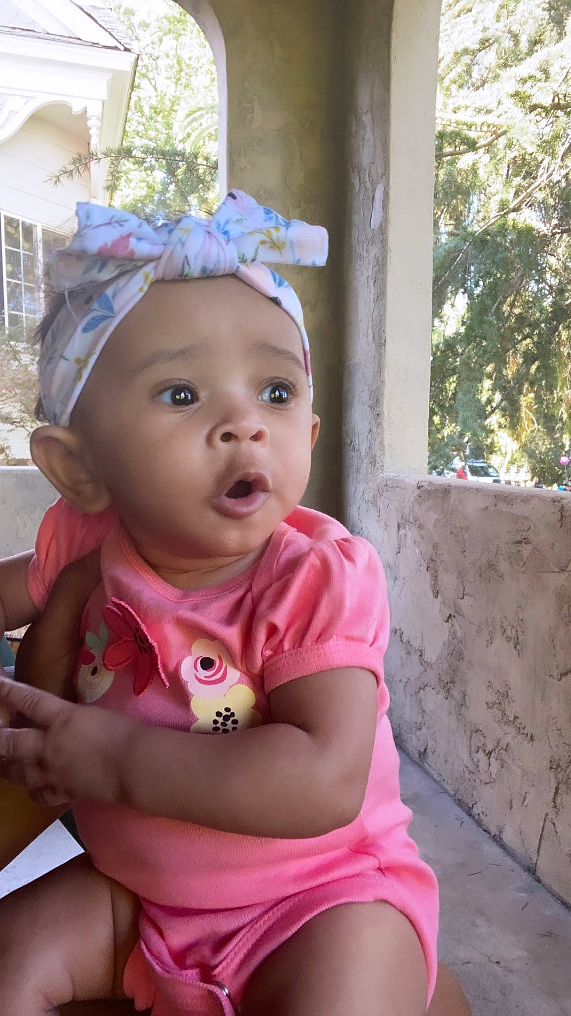 Aaryn is registered to the contest to win money with this photo: baby, baby_toddler_clothing, cap, cheek, child, chin, eye, eyelash, grass, happy, headband, headwear, human_body, leisure, lip, person, pink, skin, sun_hat, toddler