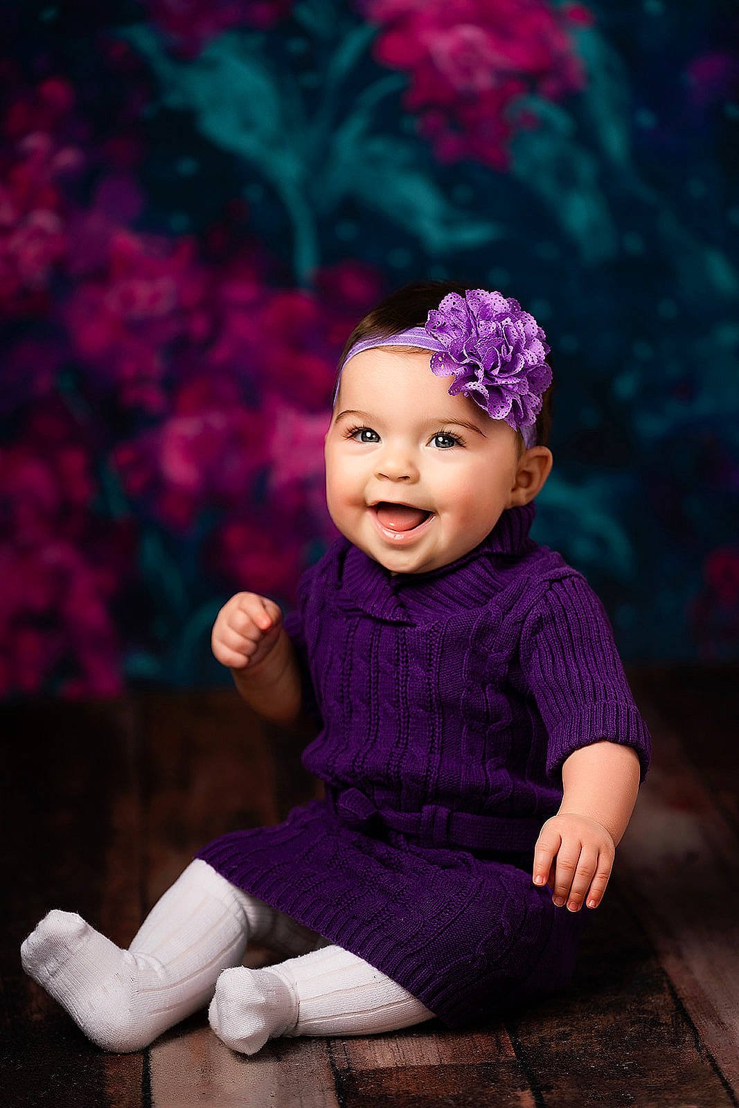Emma is registered to the contest to win money with this photo: baby, child, child_model, hair_accessory, headgear, headwear, joy, knitting, magenta, person, photograph, photography, pink, portrait, portrait_photography, purple, sitting, smile, toddler, violet