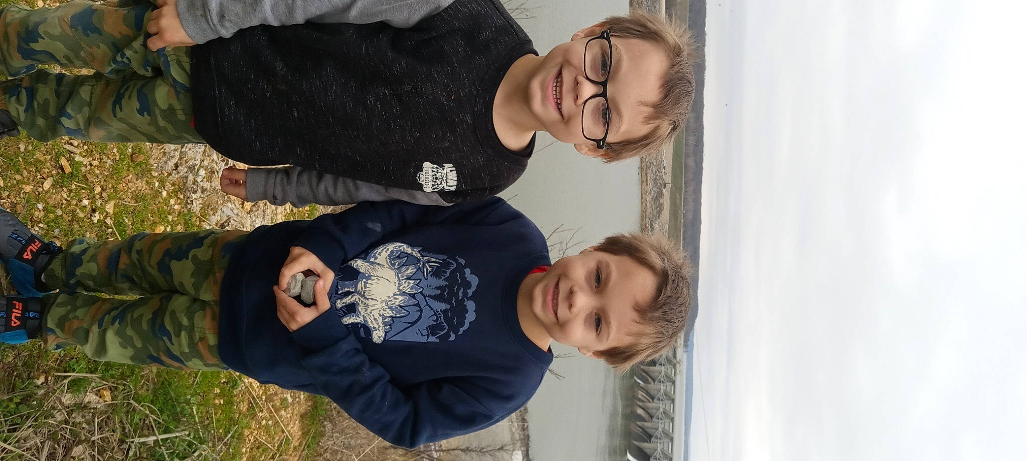 Brianand Jakob joined the competition — help win amazing prizes! child, fun, gesture, grass, happy, joy, leisure, person, plant, sitting, sleeve, smile, tree, wood