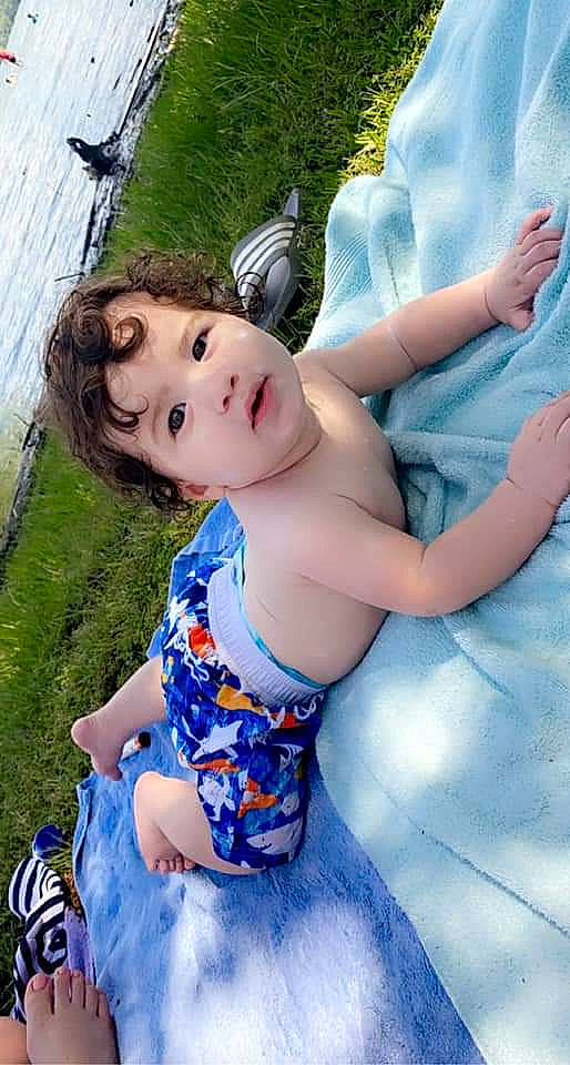 Drake joined the competition — help win amazing prizes! abdomen, azure, blue, child, doll, electric_blue, fun, grass, happy, human_leg, joint, leisure, people_in_nature, person, pink, plant, recreation, textile, thigh, toy