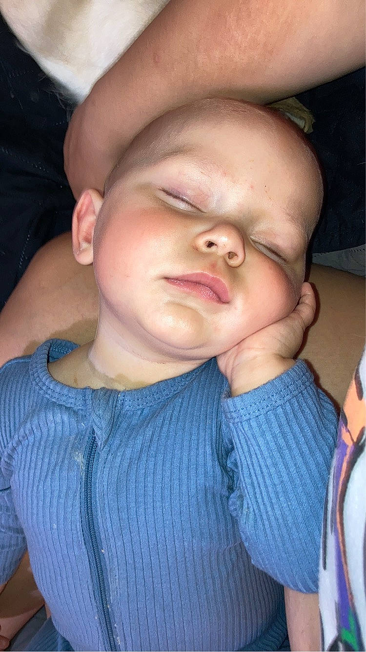 Lennon is registered to the contest to win money with this photo: baby, baby_toddler_clothing, cheek, chin, eyelash, finger, forehead, gesture, happy, iris, jaw, joint, lip, mouth, neck, nose, person, shoulder, skin, sleeve