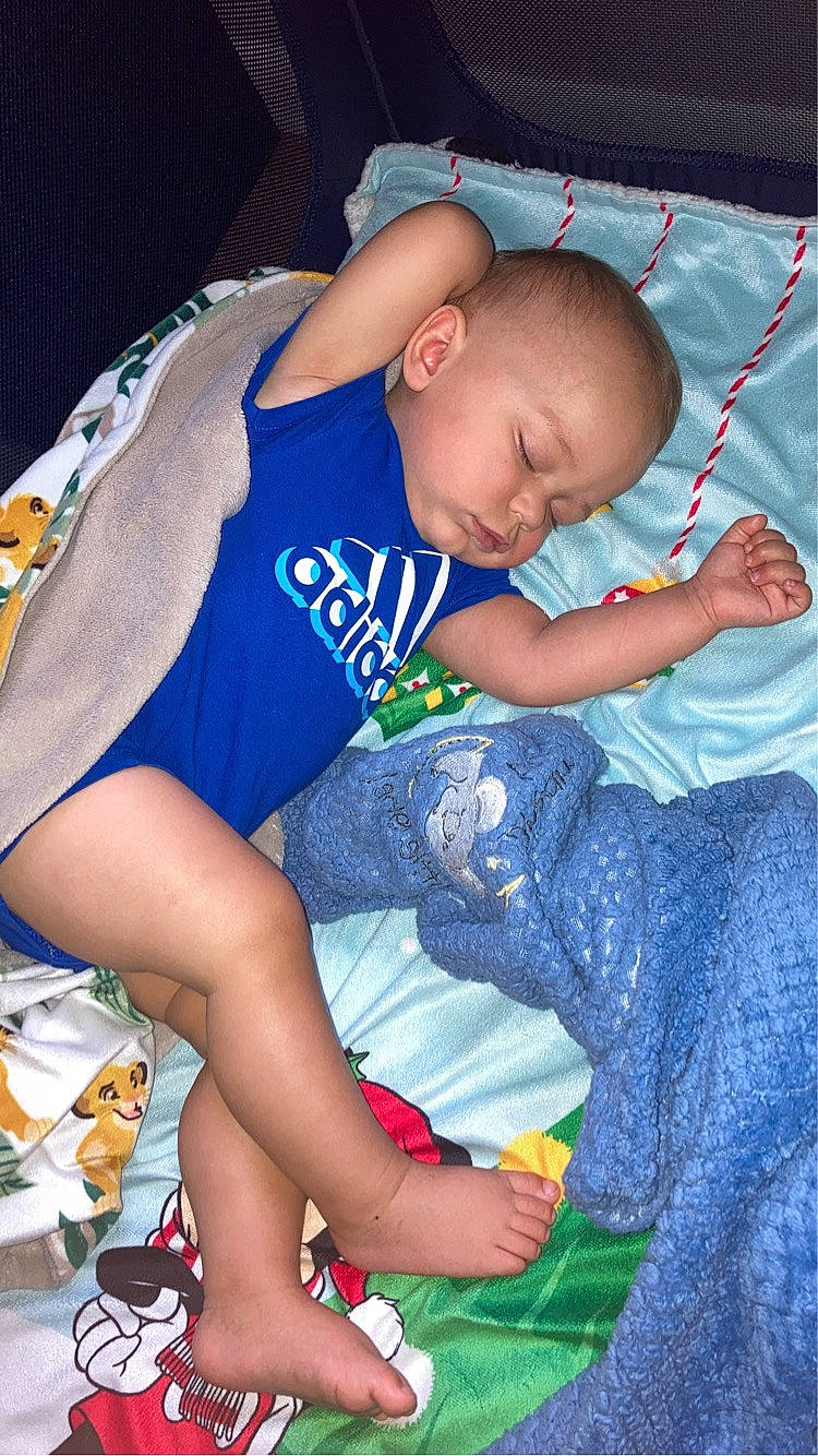 Lennon joined the competition — help win amazing prizes! baby, baby_products, baby_toddler_clothing, child, comfort, elbow, electric_blue, foot, fun, human_leg, infant_bed, knee, lap, leg, leisure, pattern, person, sitting, t_shirt, thigh