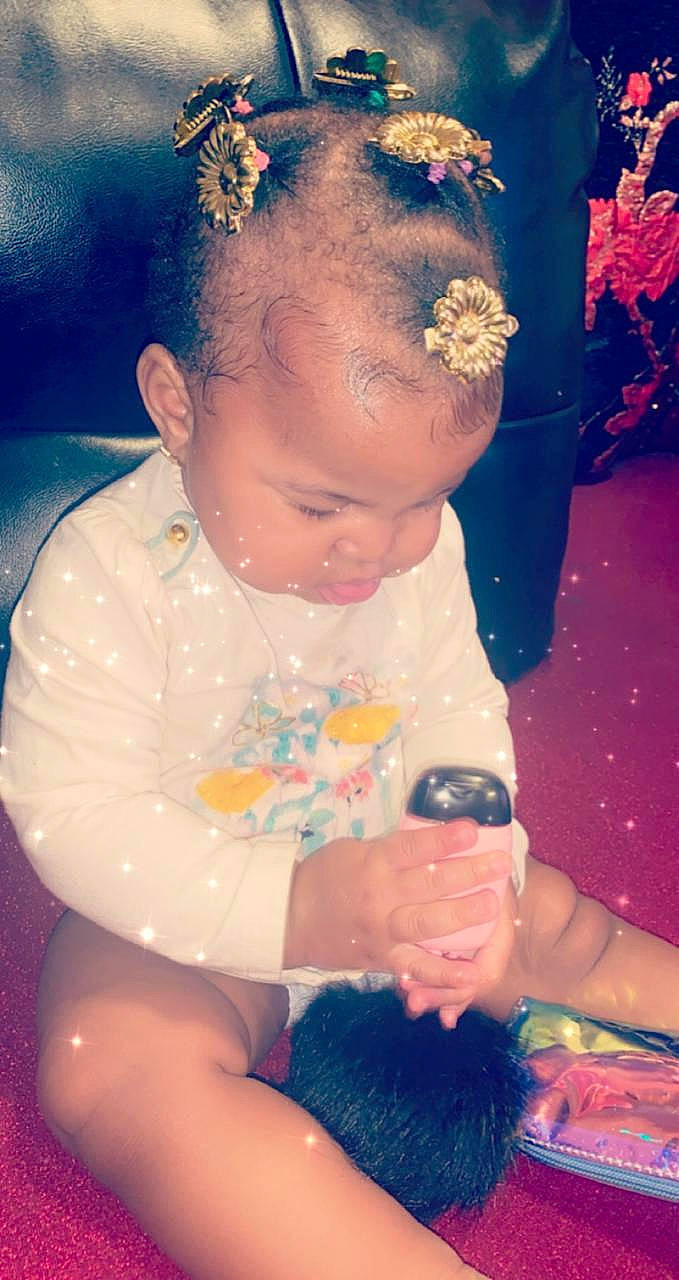 Daelynn is registered to the contest to win money with this photo: baby, baby_products, baby_toddler_clothing, bracelet, cheek, child, embellishment, hair_accessory, hand, headband, headgear, headpiece, human_body, nail, person, petal, pink, skin, tiara, toddler