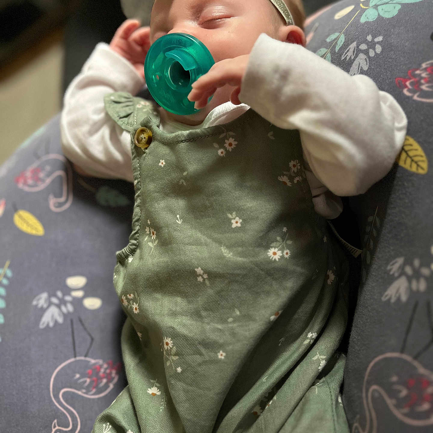 Delilah is registered to the contest to win money with this photo: baby, blanket, bodypart, clothing, couch, cushion, dress, face, finger, furniture, hand, hat, head, homedecor, newborn, pants, person, photography, portrait, toy