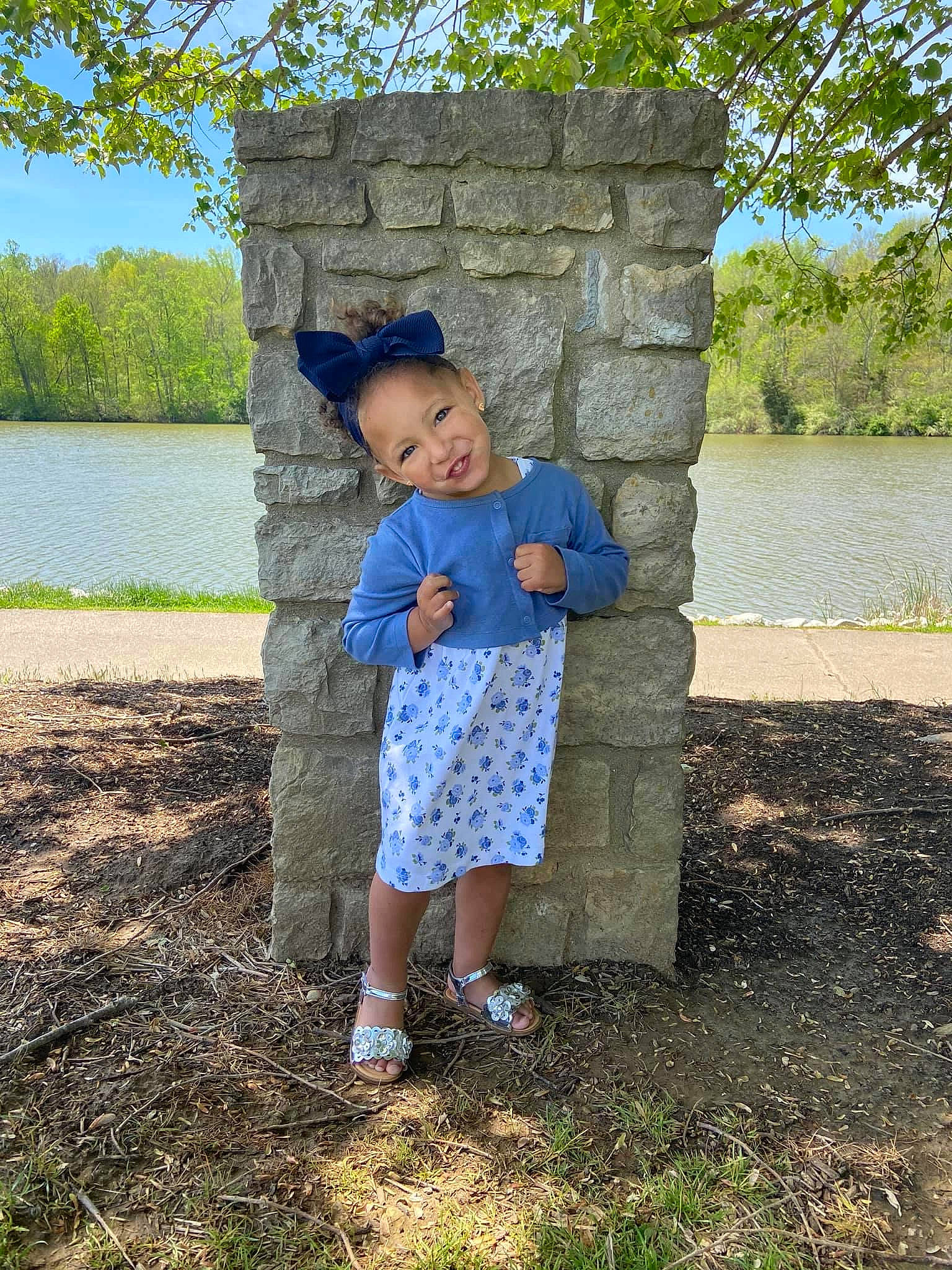 Kailynn joined the competition — help win amazing prizes! adaptation, blue, child, grass, joy, leaf, pattern, person, photography, plant, play, recreation, standing, summer, toddler, tree, vacation, water, wood