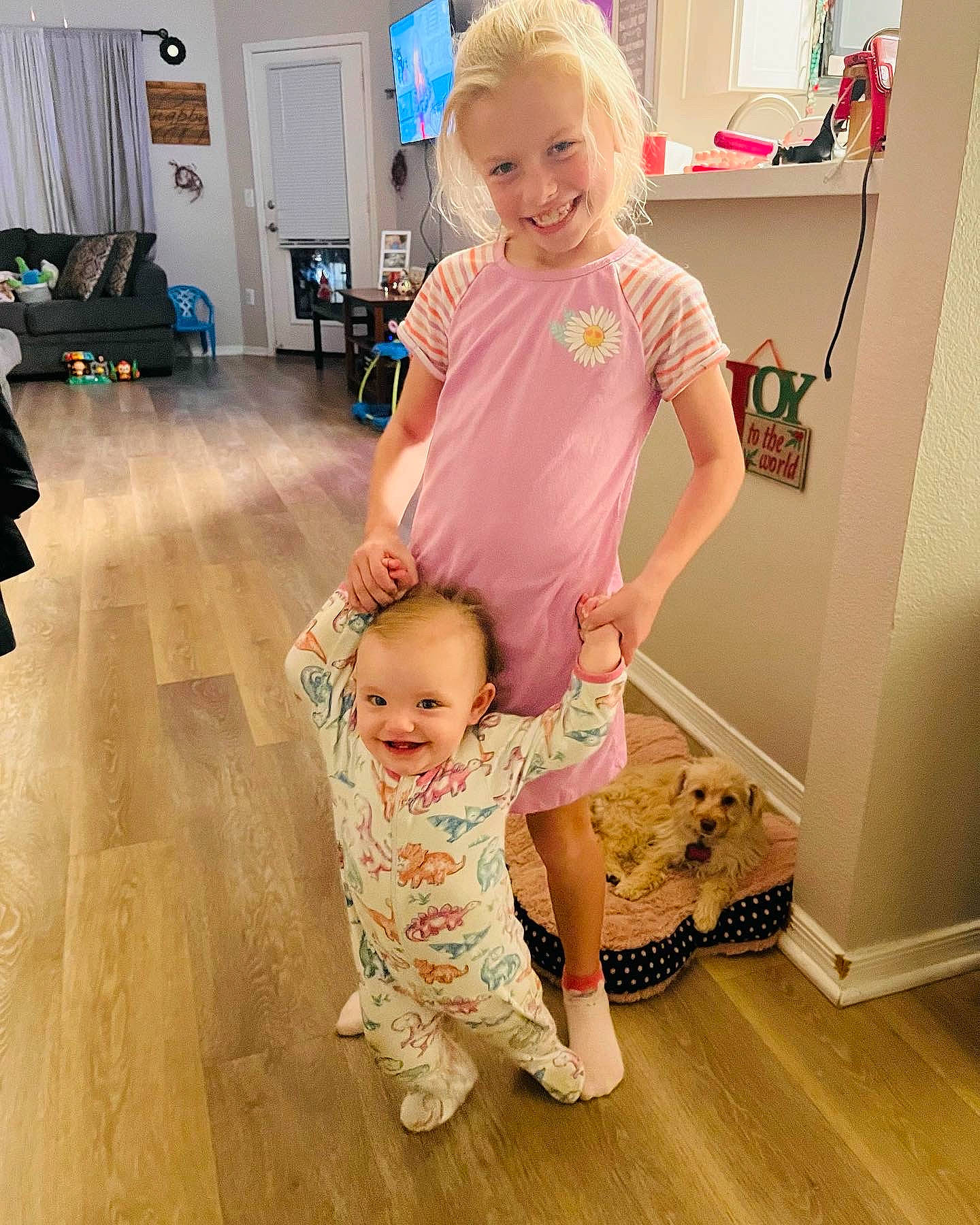 Skylar joined the competition — help win amazing prizes! baby, baby_toddler_clothing, eye, face, floor, flooring, happy, hardwood, head, human_body, joint, joy, laminate_flooring, person, product, shoulder, skin, sleeve, smile, standing