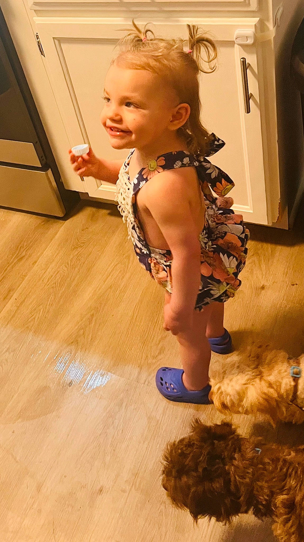 Dallas is registered to the contest to win money with this photo: abdomen, baby, child, fawn, floor, flooring, foot, fun, hair, happy, hardwood, human_leg, joy, laminate_flooring, person, skin, smile, thigh, toddler, trunk