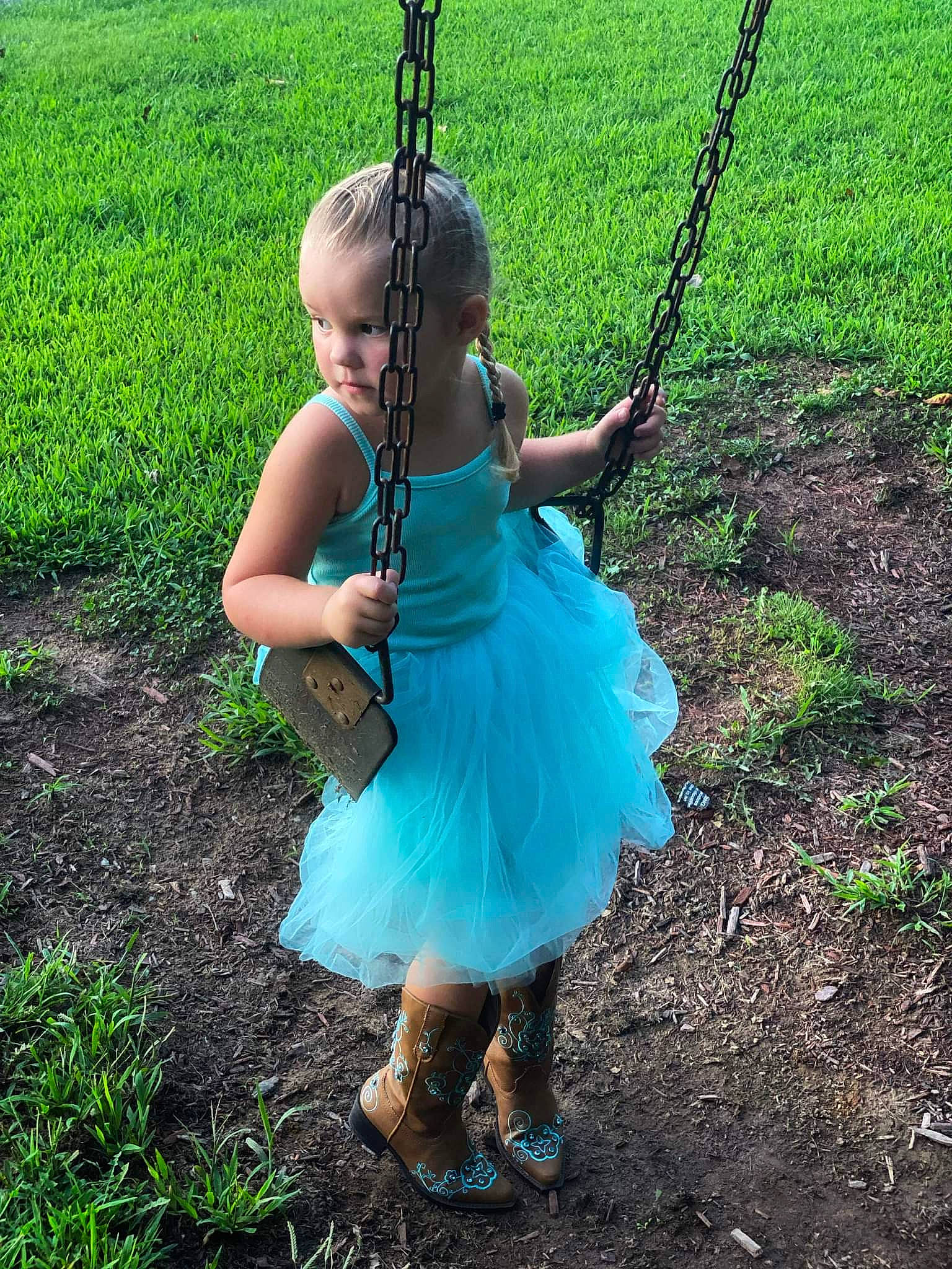 Chelsea is registered to the contest to win money with this photo: baby, baby_toddler_clothing, dress, electric_blue, fun, grass, happy, leaf, leisure, musical_instrument, outdoor_play_equipment, people_in_nature, person, plant, playground, pole, recreation, sandal, swing, toddler