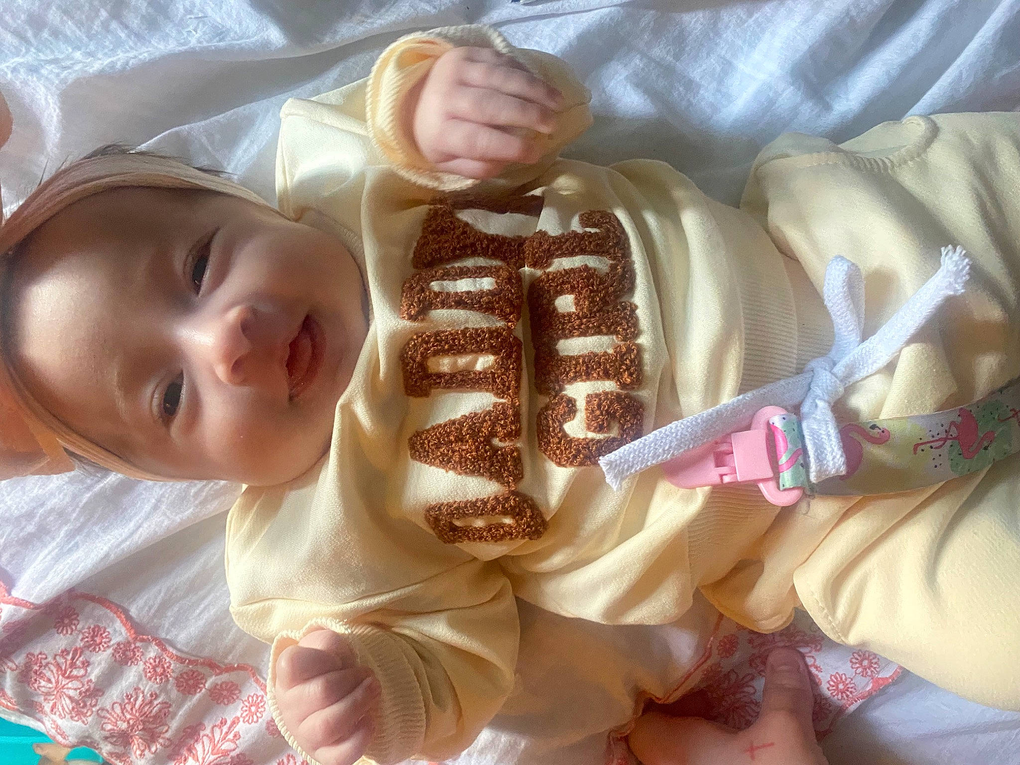 Malaya is registered to the contest to win money with this photo: abdomen, baby, baby_toddler_clothing, chest, child, cuisine, fashion_accessory, food, gesture, happy, ingredient, nail, pattern, peach, person, skin, sweetness, textile, thumb, toddler