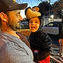 Chase joined the competition — help win amazing prizes! toddler, child, man, costume, mouse, hat, outdoor, evening, autumn, leaves, parking_lot, car, holding, smiling, portrait, person, casual_clothing, family, fun, happy