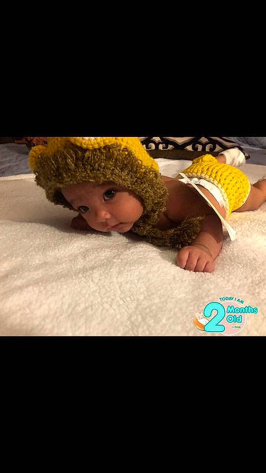 Jesiah joined the competition — help win amazing prizes! baby, child, headgear, knit_cap, person, toddler, yellow