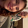Harlan is registered to the contest to win money with this photo: woman, baby, smile, pajamas, bed, blanket, indoor, portrait, joyful, face, person, home, hair, clothing, child, young, happy, furniture, casual, cozy