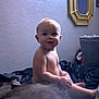 Harlan joined the competition — help win amazing prizes! baby, child, indoor, shirtless, bed, blanket, mirror, wall, curious, blue_eyes, soft_lighting, furniture, home, portrait, infant, sitting, skin, cute, young, cozy