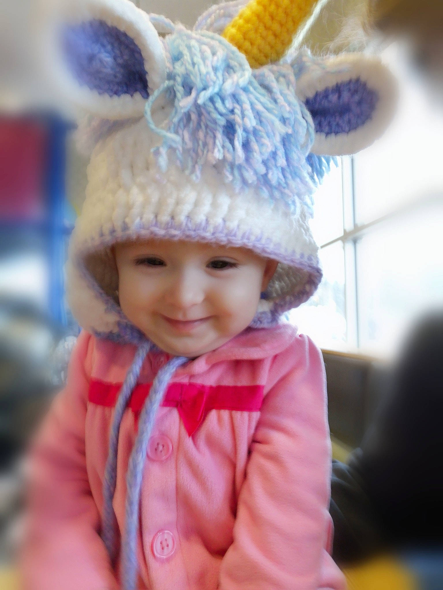 Reiya is registered to the contest to win money with this photo: baby, beanie, bonnet, cap, child, crochet, ear, fashion_accessory, hat, headgear, joy, knit_cap, organ, person, pink, smile, toddler, wool