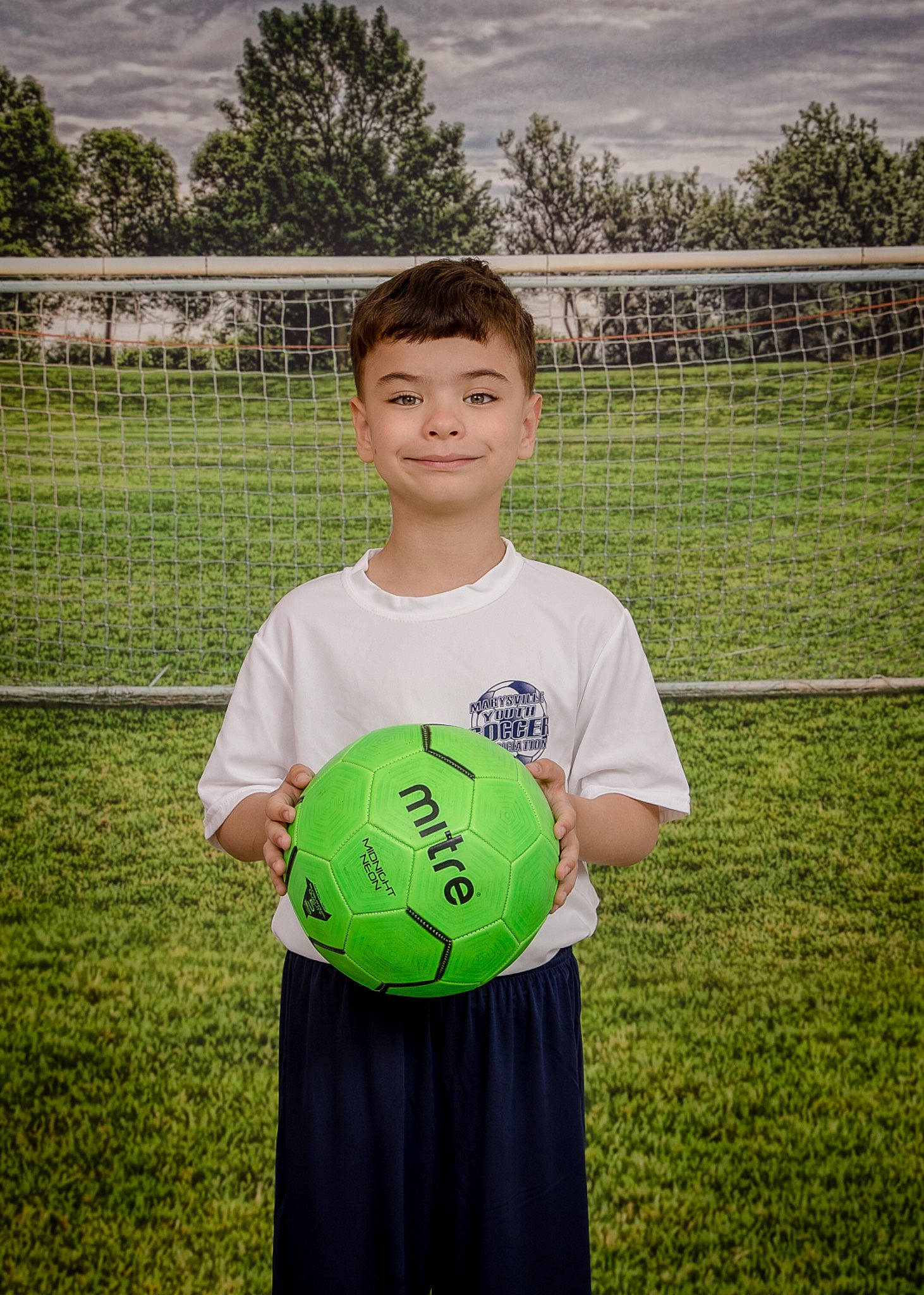 Devin is registered to the contest to win money with this photo: ball, ball_game, cloud, football, football_player, grass, happy, joy, people_in_nature, person, player, playing_sports, shorts, sky, soccer, soccer_ball, sports, sports_equipment, t_shirt, team_sport