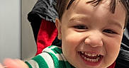 Bryan Matheus joined the competition — help win amazing prizes! toddler, child, smiling, face, striped_clothing, green, white, red, indoor, happy, headband, halo, baby, portrait, cute, person, young_child, closeup, expression, joy