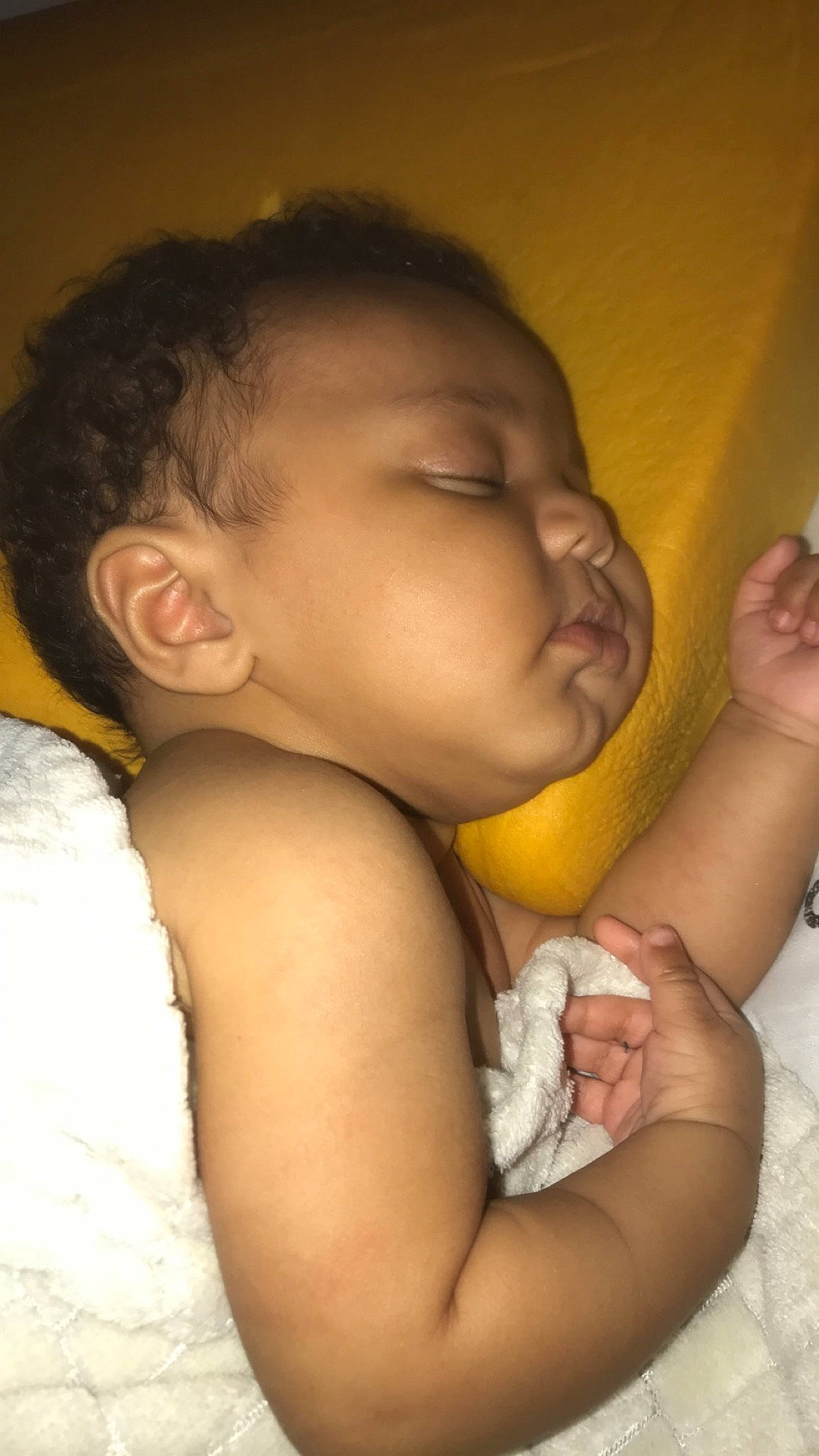Tristen is registered to the contest to win money with this photo: baby_toddler_clothing, black_hair, cheek, child, comfort, ear, elbow, eyebrow, eyelash, finger, forehead, hand, mammal, nail, nap, neck, organ, person, skin, sleep