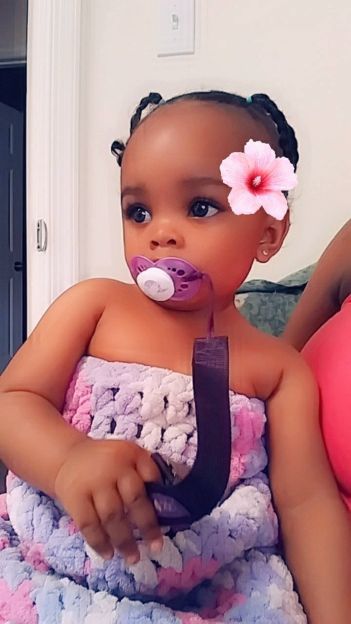 Cataleya is registered to the contest to win money with this photo: baby, baby_toddler_clothing, birth, cheek, child, ear, face, fashion_accessory, hair_accessory, head, headband, headgear, headpiece, human, lip, nose, person, pink, purple, skin