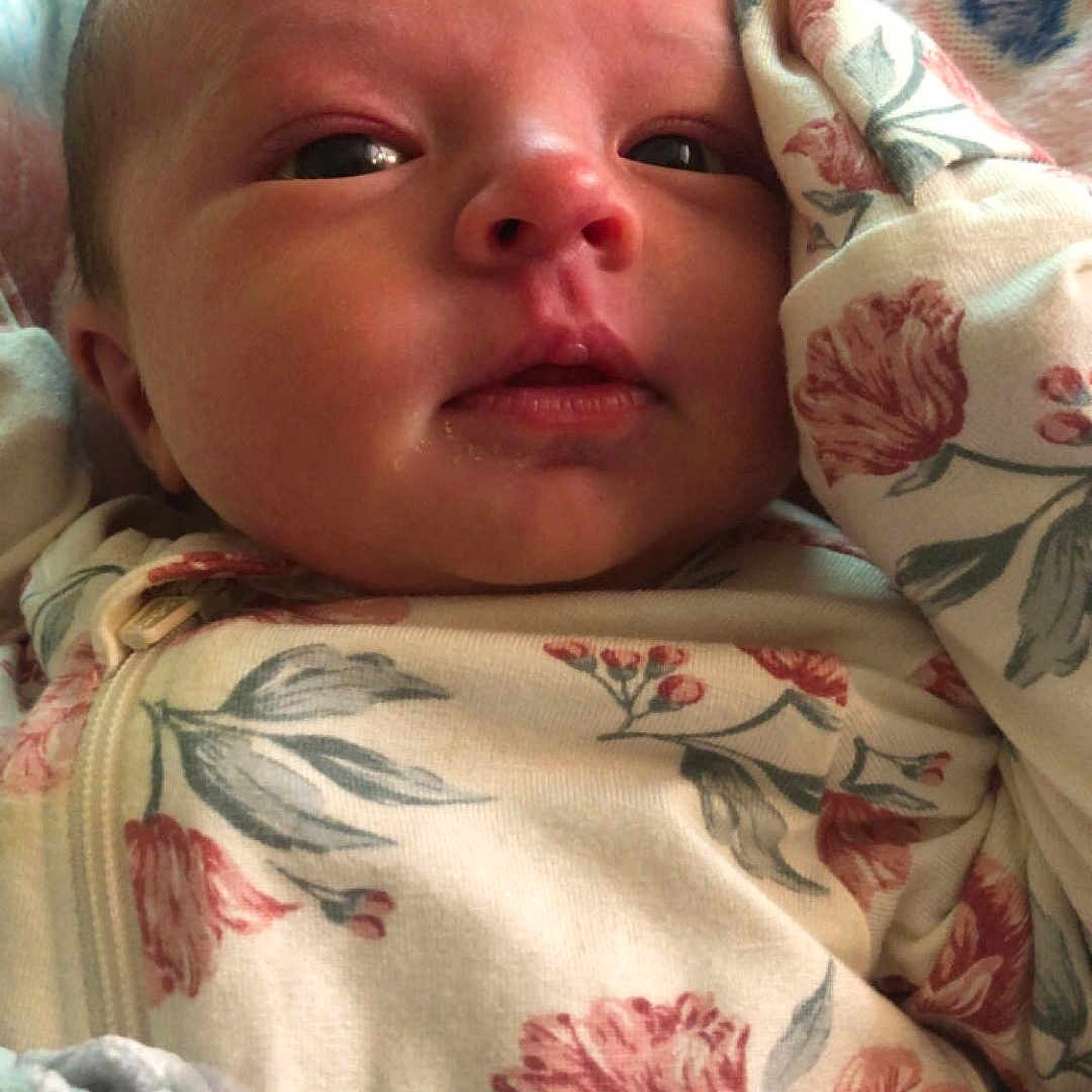 Aryn joined the competition — help win amazing prizes! architecture, baby, bed, bedroom, blanket, building, clothing, cushion, face, furniture, glove, head, homedecor, hospital, newborn, person, photography, portrait, quilt, sleeping