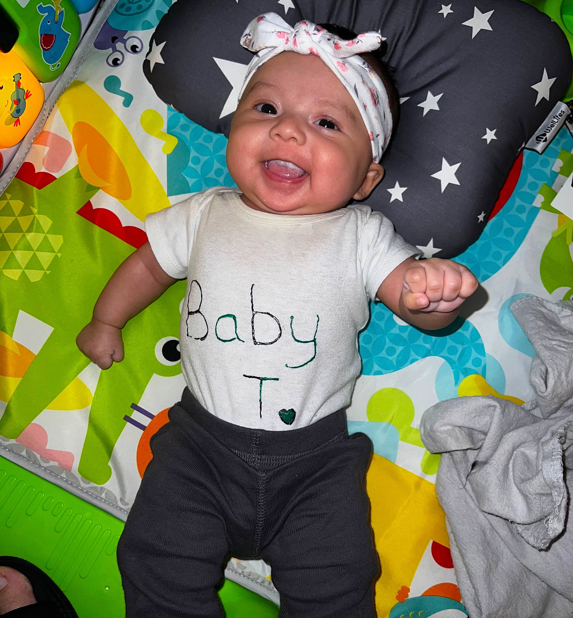 Temari joined the competition — help win amazing prizes! arm, baby, baby_toddler_clothing, cheek, child, cool, facial_expression, finger, fun, gesture, happy, headwear, person, photograph, pink, product, sleeve, smile, t_shirt, textile