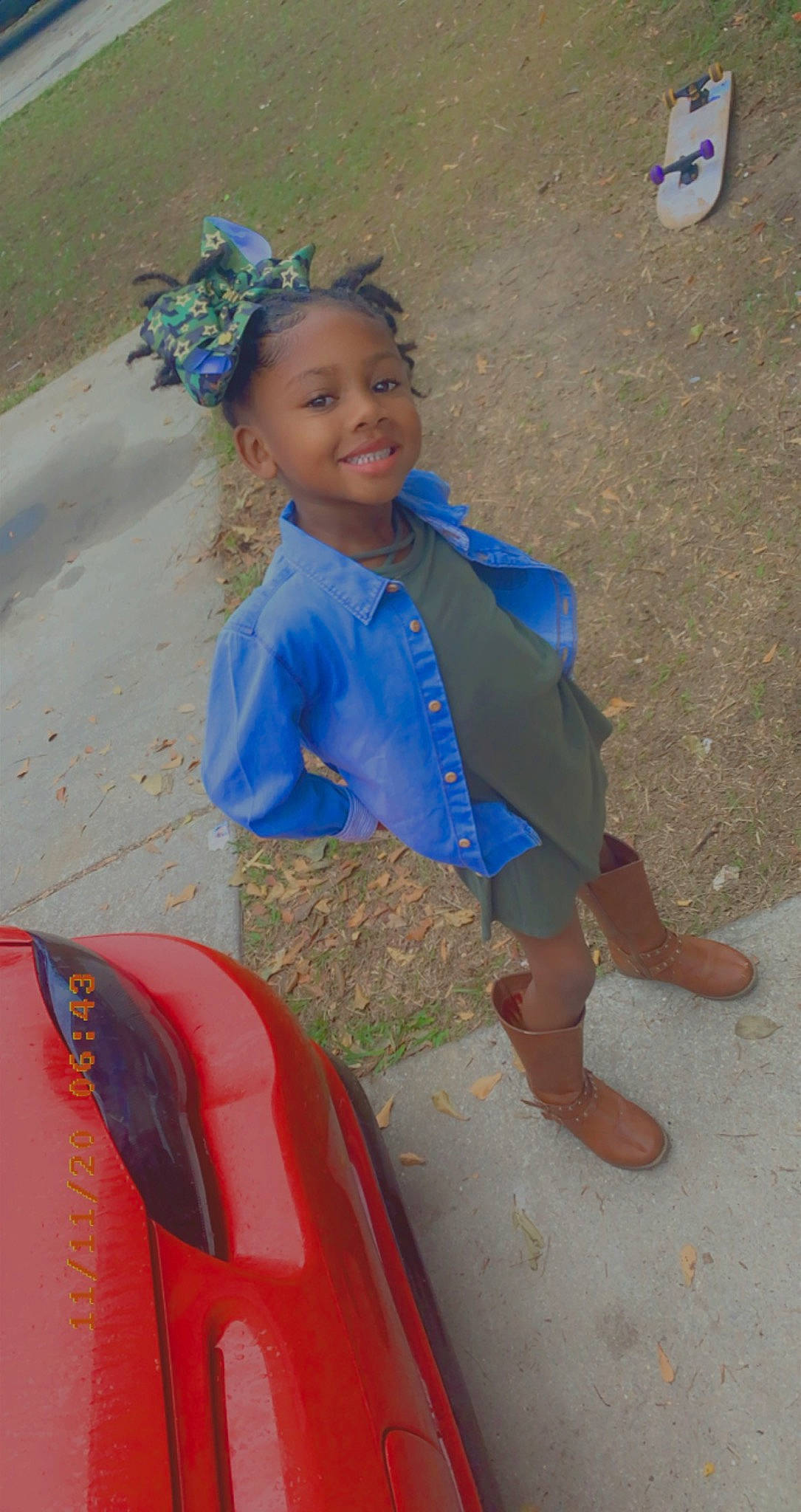 Aubrielle is registered to the contest to win money with this photo: beach, blue, child, electric_blue, foot, fun, happy, head, joy, leisure, motor_vehicle, person, personal_protective_equipment, recreation, sand, sandal, sitting, smile, summer, toddler