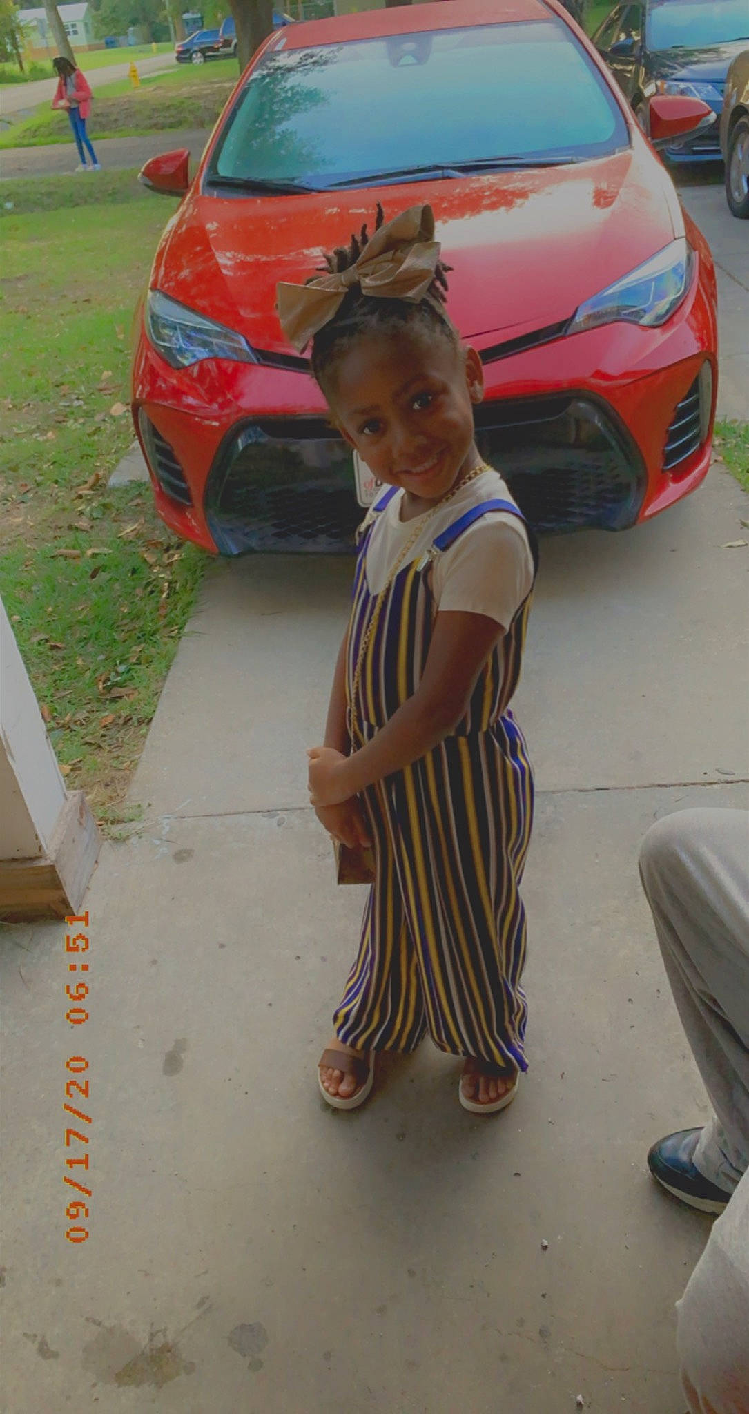 Aubrielle is registered to the contest to win money with this photo: alloy_wheel, asphalt, automotive_design, automotive_exterior, automotive_lighting, automotive_tire, automotive_wheel_system, bumper, car, hood, joy, motor_vehicle, person, personal_luxury_car, rim, shoe, tire, trunk, vehicle, vehicle_door