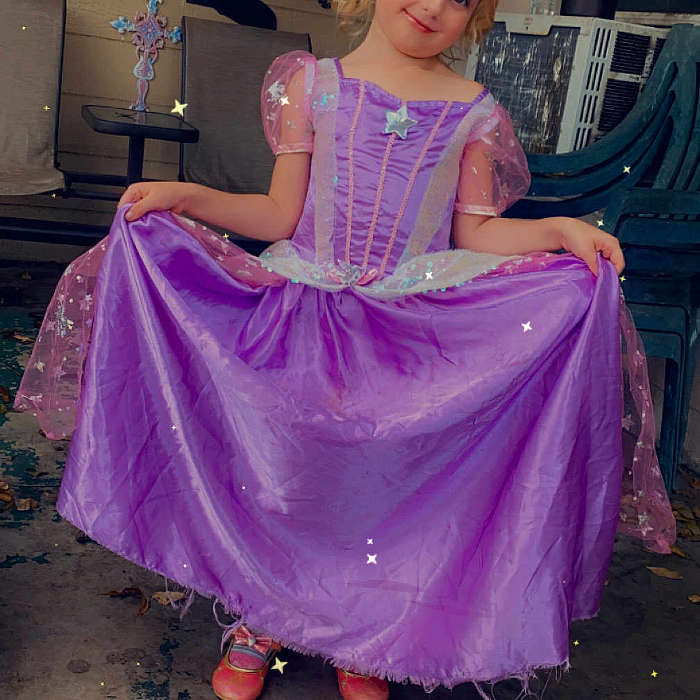 Victoria Desalvo is registered to the contest to win money with this photo: child, clothing, costume, dress, eveningdress, face, fashion, female, footwear, formalwear, girl, gown, head, lady, person, photography, portrait, sandal, shoe, sitting