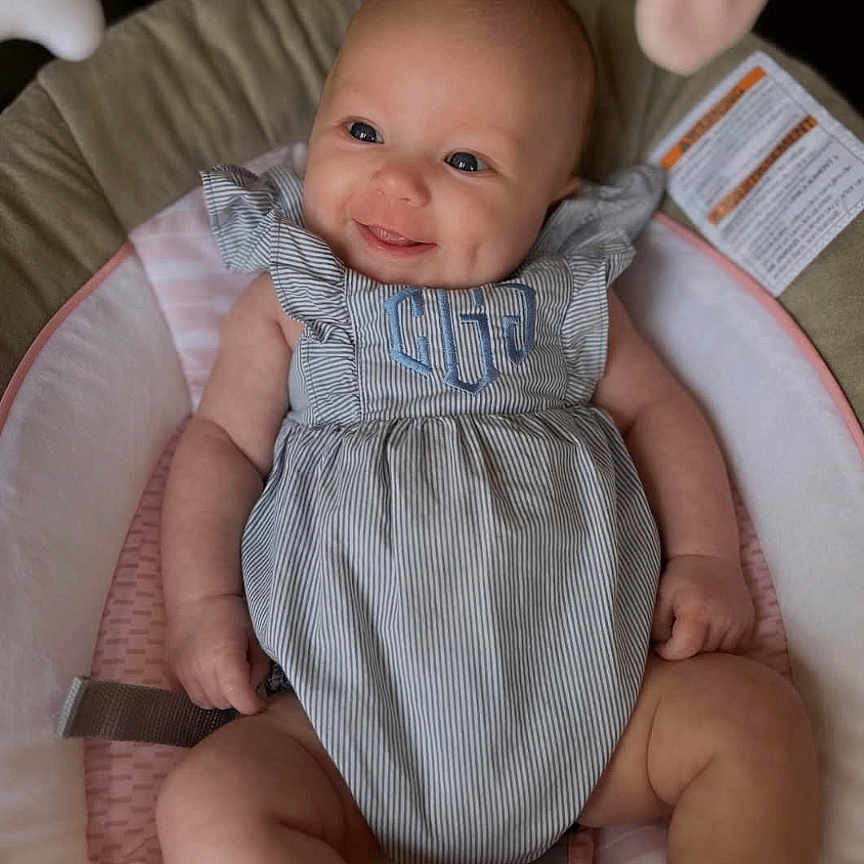 Charlotte joined the competition — help win amazing prizes! baby, bed, bodypart, clothing, crib, cushion, face, finger, furniture, hand, happy, head, homedecor, infantbed, newborn, pants, person, photography, portrait, smile