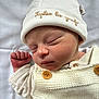 baby, child, closeup, cozy, cute, face, fist, hat, infant, knitted_clothing, newborn, peaceful, portrait, resting, skin, sleeping, soft, tiny, warm, white