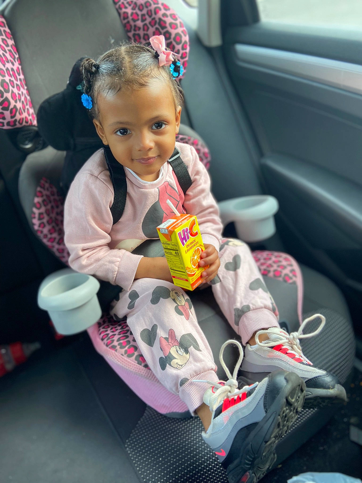 Ivy is registered to the contest to win money with this photo: auto_part, automotive_design, automotive_exterior, baby_products, car, car_seat, car_seat_cover, child, dress, event, family_car, happy, joy, luxury_vehicle, motor_vehicle, person, personal_luxury_car, sitting, steering_wheel, toddler