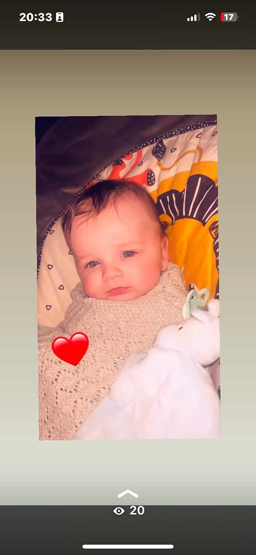 Kaige-Ray is registered to the contest to win money with this photo: baby, infant, blanket, knitted, plush_toy, pacifier, heart_emoji, blue_eyes, face, cute, child, indoor, portrait, lying_down, soft_toy, warm_colors, young_child, comfort, sleepy, adorable