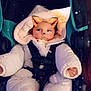 baby, blanket, car_seat, child, child_seat, cozy, cute, expression, face, filter, fox_ears, indoors, infant, portrait, snow_effect, snowsuit, soft_lighting, warm, whiskers, winter_clothing