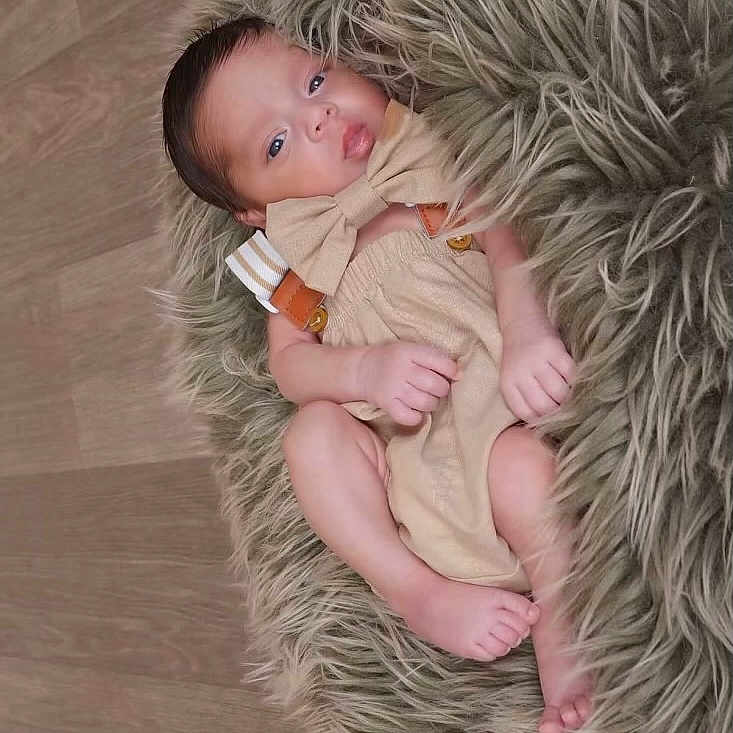 Aveer joined the competition — help win amazing prizes! accessories, baby, blanket, bodypart, couch, cushion, face, finger, furniture, happy, head, homedecor, jewelry, necklace, newborn, person, photography, portrait, sleeping, smile