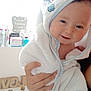 Azzalia joined the competition — help win amazing prizes! baby, bathroom, blue, cartoon, child, cute, face, hand, happy, holding, hooded_towel, indoor, infant, person, portrait, smile, soft, toiletries, towel, white