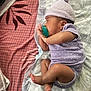 Parthi And Purvi joined the competition — help win amazing prizes! baby, newborn, infant, pacifier, knit_hat, polka_dot_onesie, blanket, bed_sheet, bed, feet, hand, ear, side_profile, lying_down, cozy, indoor, portrait, peaceful, skin, sleeping_area