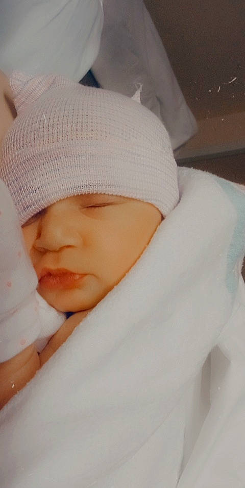 Avianna joined the competition — help win amazing prizes! baby, baby_products, baby_sleeping, baby_toddler_clothing, beanie, bedtime, cap, cheek, child, comfort, face, hand, headgear, headwear, knit_cap, linens, nap, person, sleeve, thumb