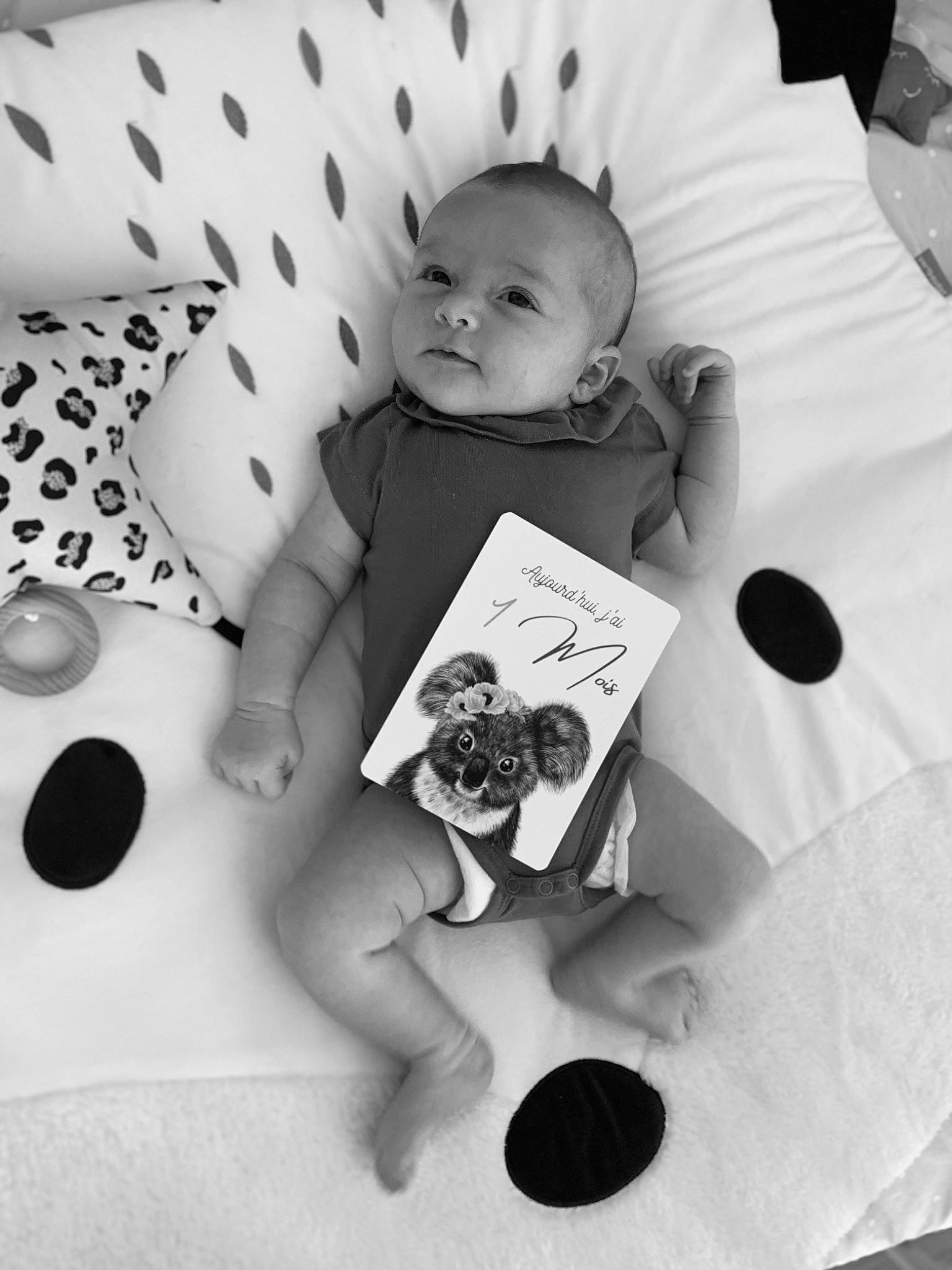 Alba participe au concours pour gagner de l'argent avec cette photo : baby, baby_toddler_clothing, black, black_and_white, child, comfort, design, font, grey, hand, happy, linens, monochrome, monochrome_photography, pattern, person, photograph, snapshot, style, toddler
