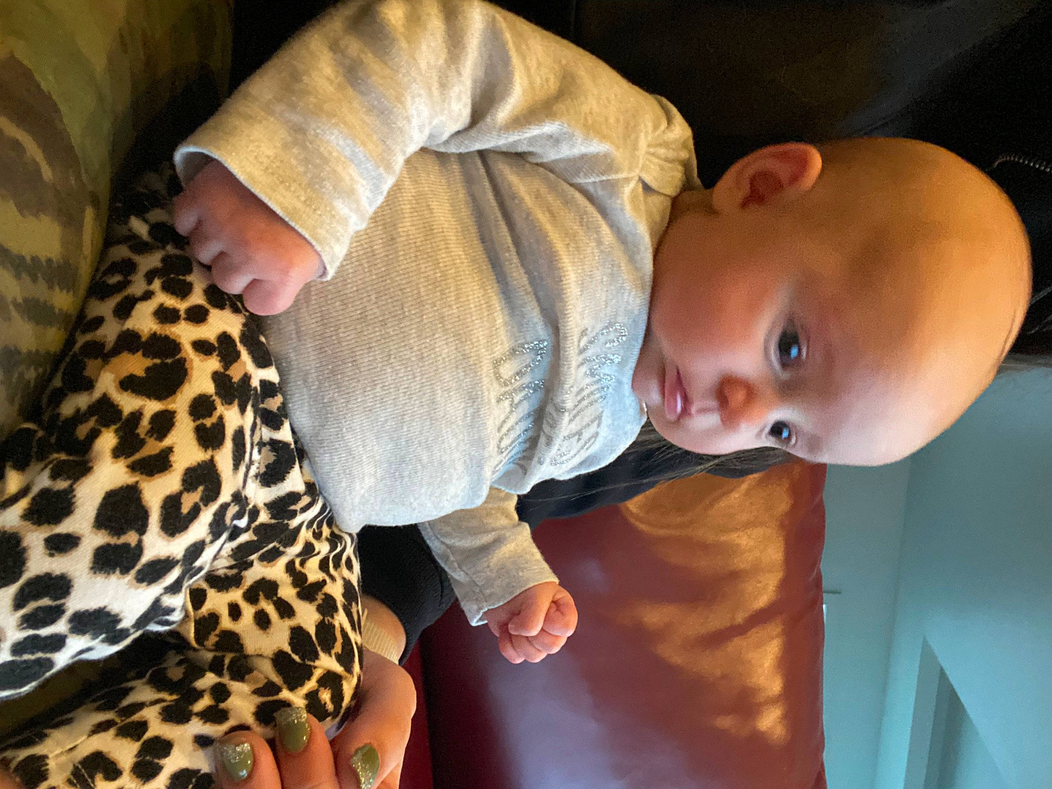Bristol is registered to the contest to win money with this photo: baby, baby_toddler_clothing, child, comfort, elbow, eye, felidae, finger, hand, human_body, mammal, nose, organ, person, skin, sleeve, smile, terrestrial_animal, toddler, vertebrate
