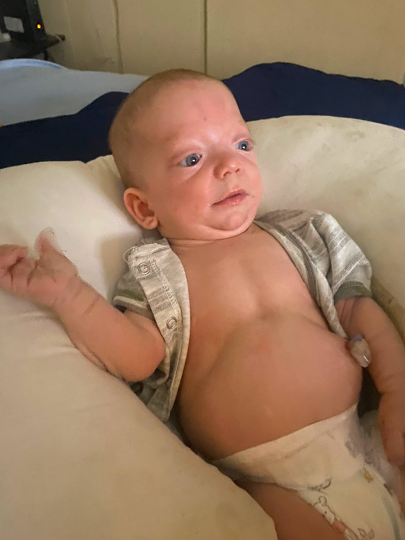 Owen is registered to the contest to win money with this photo: abdomen, baby, cheek, chest, child, chin, comfort, elbow, eyebrow, human_leg, knee, lip, mouth, neck, person, skin, stomach, thigh, thumb, toddler