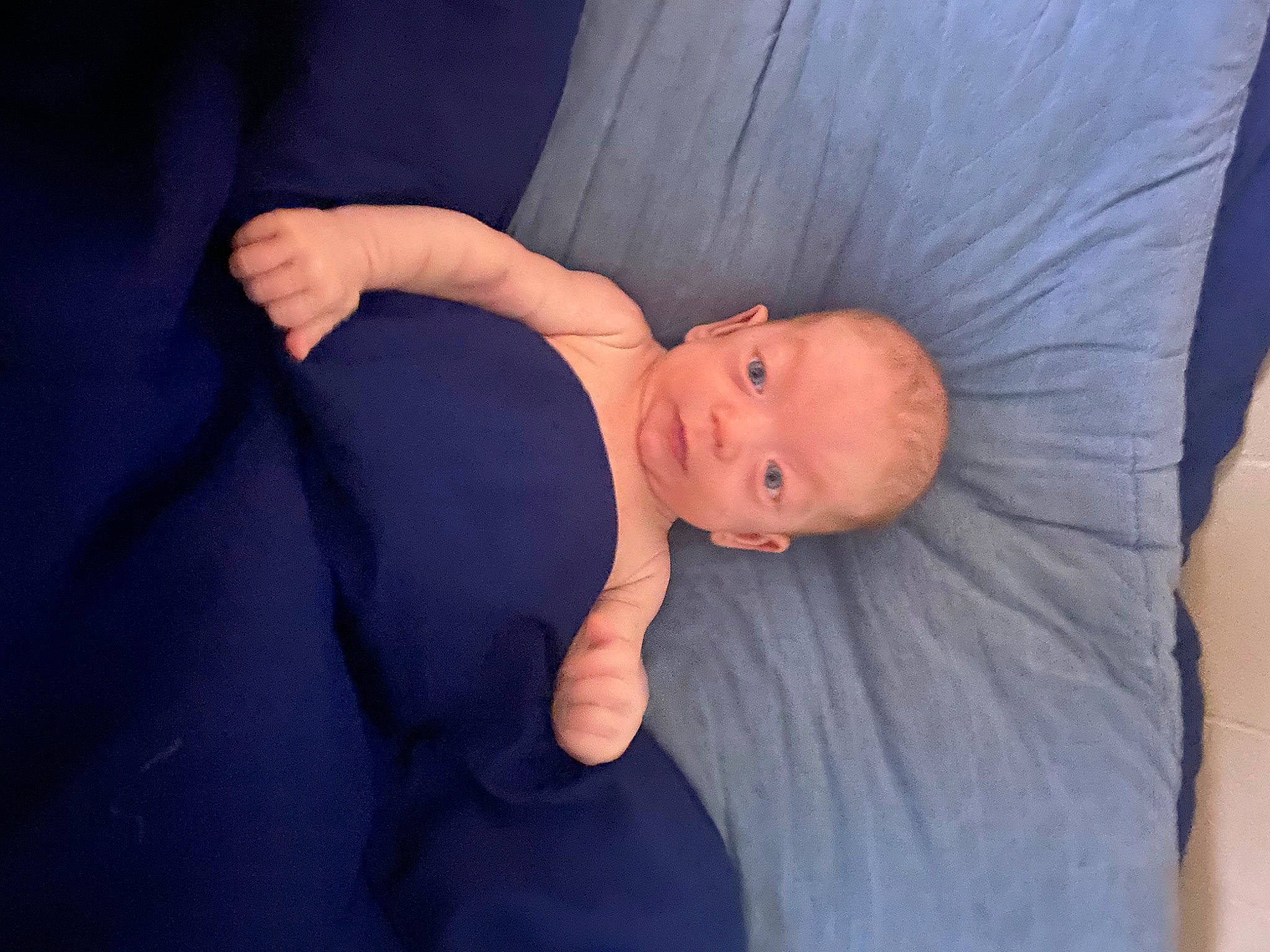Owen joined the competition — help win amazing prizes! baby, baby_toddler_clothing, child, comfort, couch, elbow, electric_blue, eye, finger, gesture, human_body, linens, nail, person, sitting, sleeve, thumb, toddler