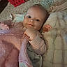 Alyra joined the competition — help win amazing prizes! baby, infant, child, portrait, face, smiling, lying_down, blanket, pink_blanket, plush_toy, bedding, bed, cozy, indoors, nursery, baby_clothing, hand, eyes, soft_lighting, close_up
